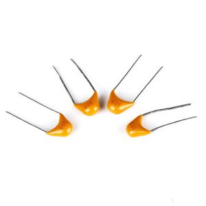 Radial lead multilayer hidden ceramic capacitor